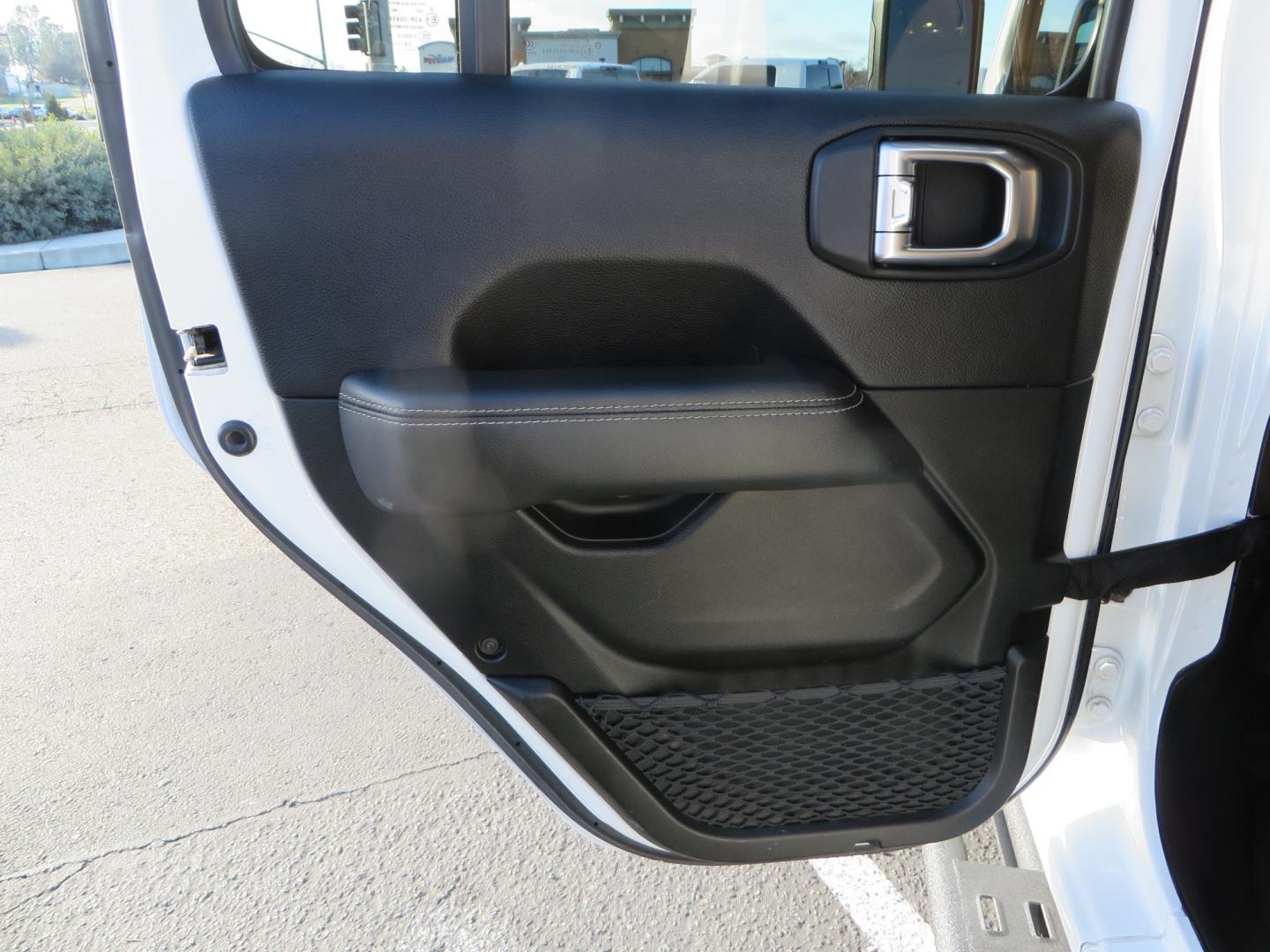 2020 White /TAN Jeep Wrangler Unlimited Rubicon (1C4HJXFG8LW) with an 3.6L V6 DOHC 24V FFV engine, 6A transmission, located at 2630 Grass Valley Highway, Auburn, CA, 95603, (530) 508-5100, 38.937893, -121.095482 - 3" Zone offroad suspension system, Fox adventure series shocks, rocksliders, Teraflex HD tire relocation, Mopar HD tailgate hinge, 17" KMC wheels, and 37" BFG KO2 tires. - Photo#38